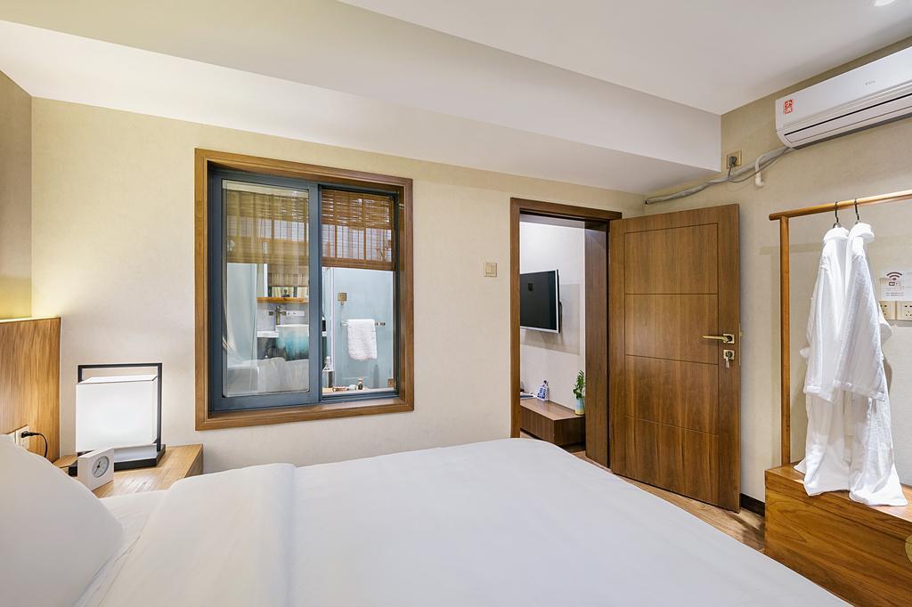 Hangzhou Puyu Travelling With Hotel Exterior photo
